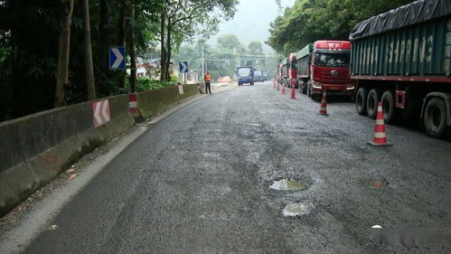 国道319线沥青砼路面挖补工程节前顺利完工通车